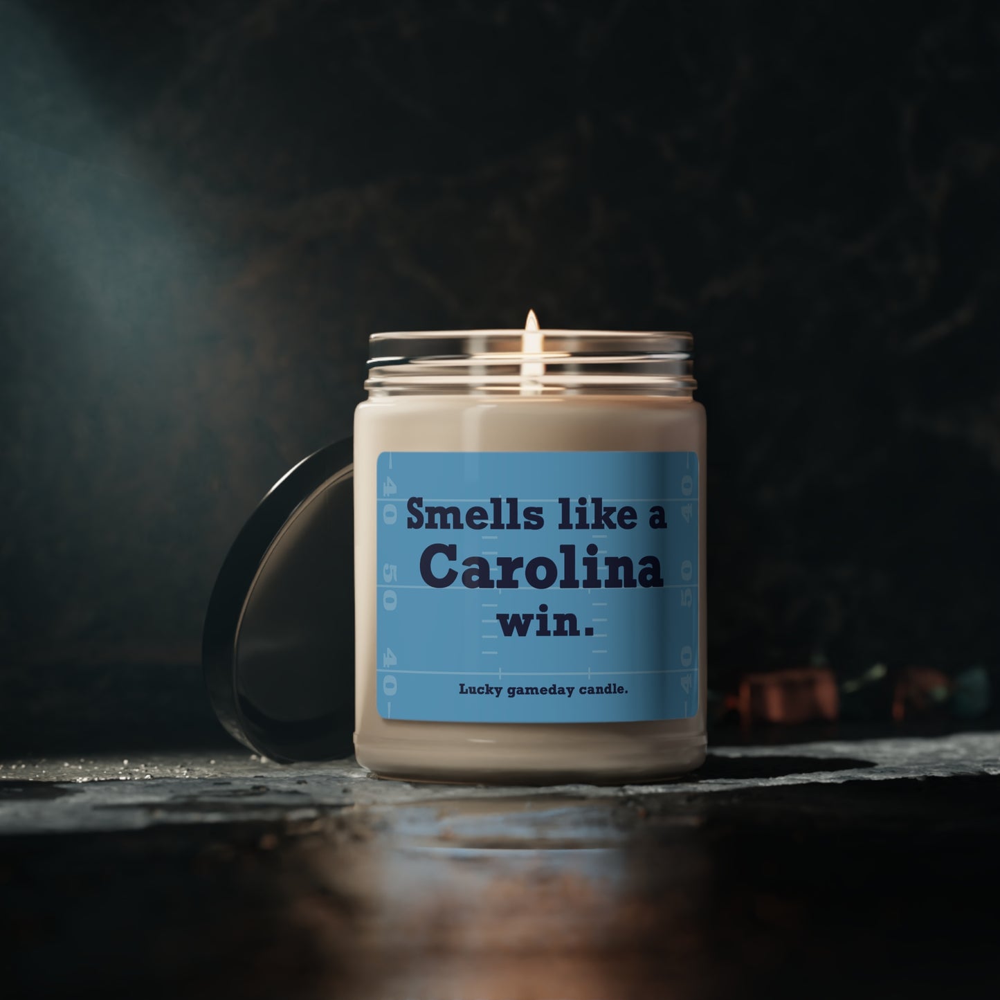 UNC Football - "Smells like a Carolina win" scented candle (9 oz)