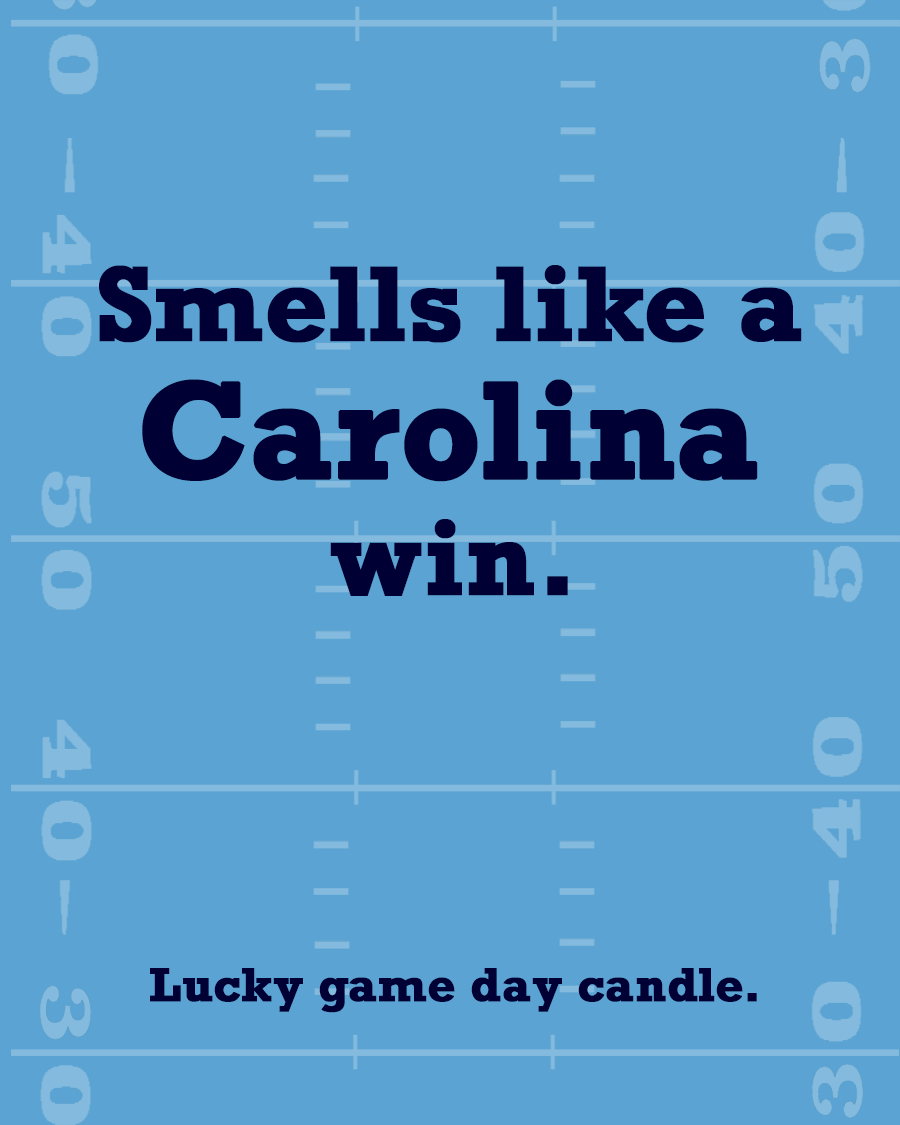 UNC Football - "Smells like a Carolina win" scented candle (13.75 oz)