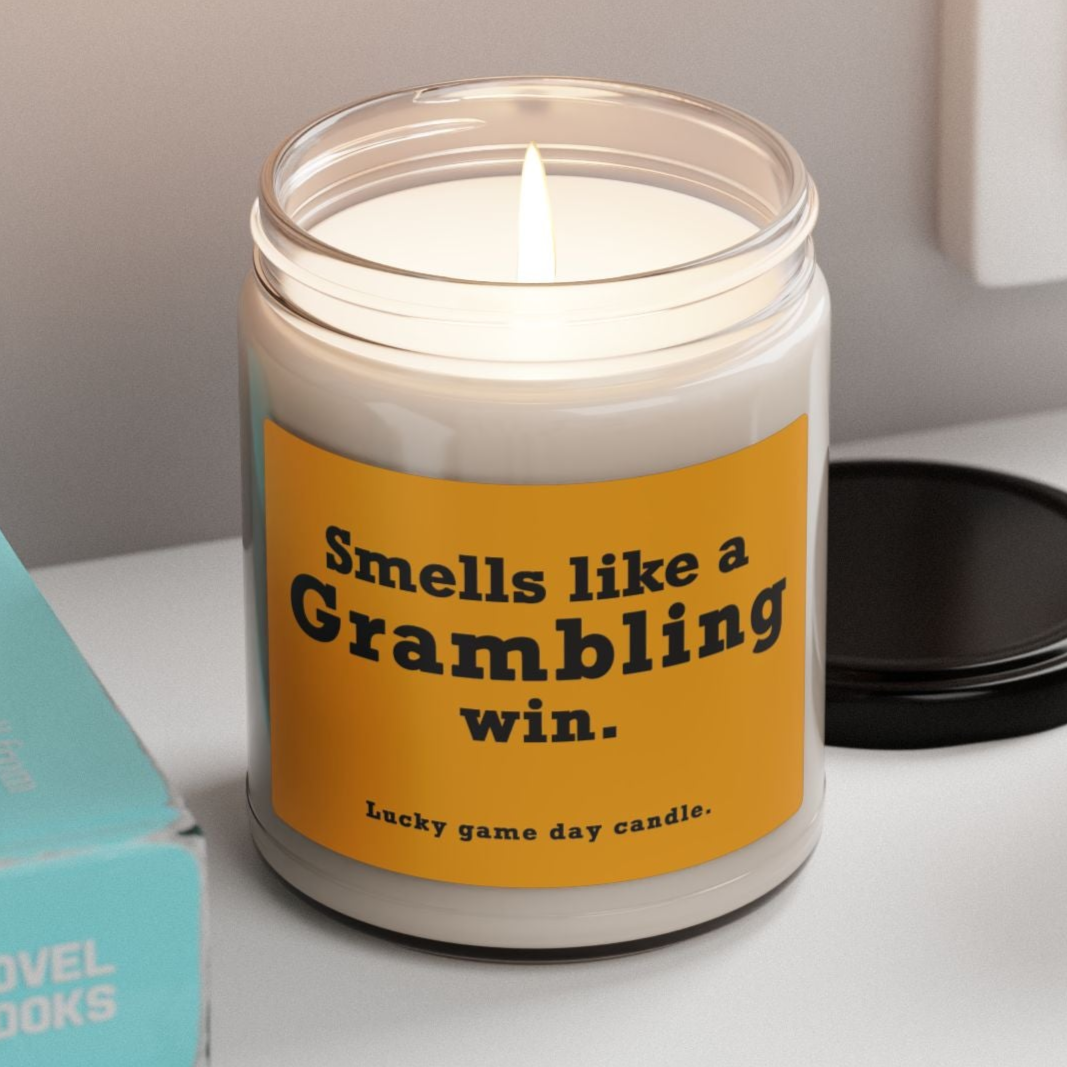 Grambling candle with a humorous label on a surface