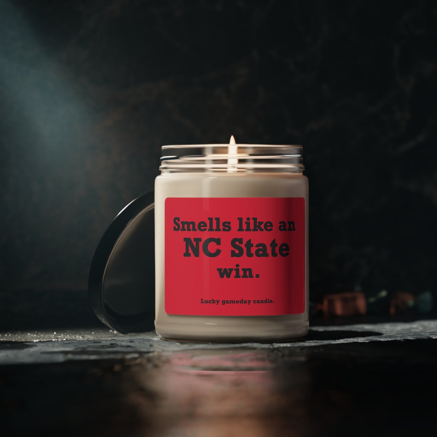 NC State - "Smells like an NC State win" scented candle (9 oz)