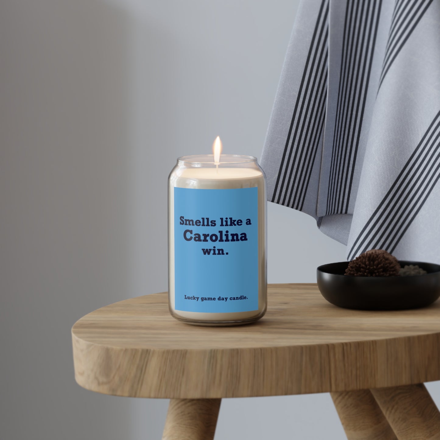 UNC - "Smells like a Carolina win" scented candle (13.75 oz)