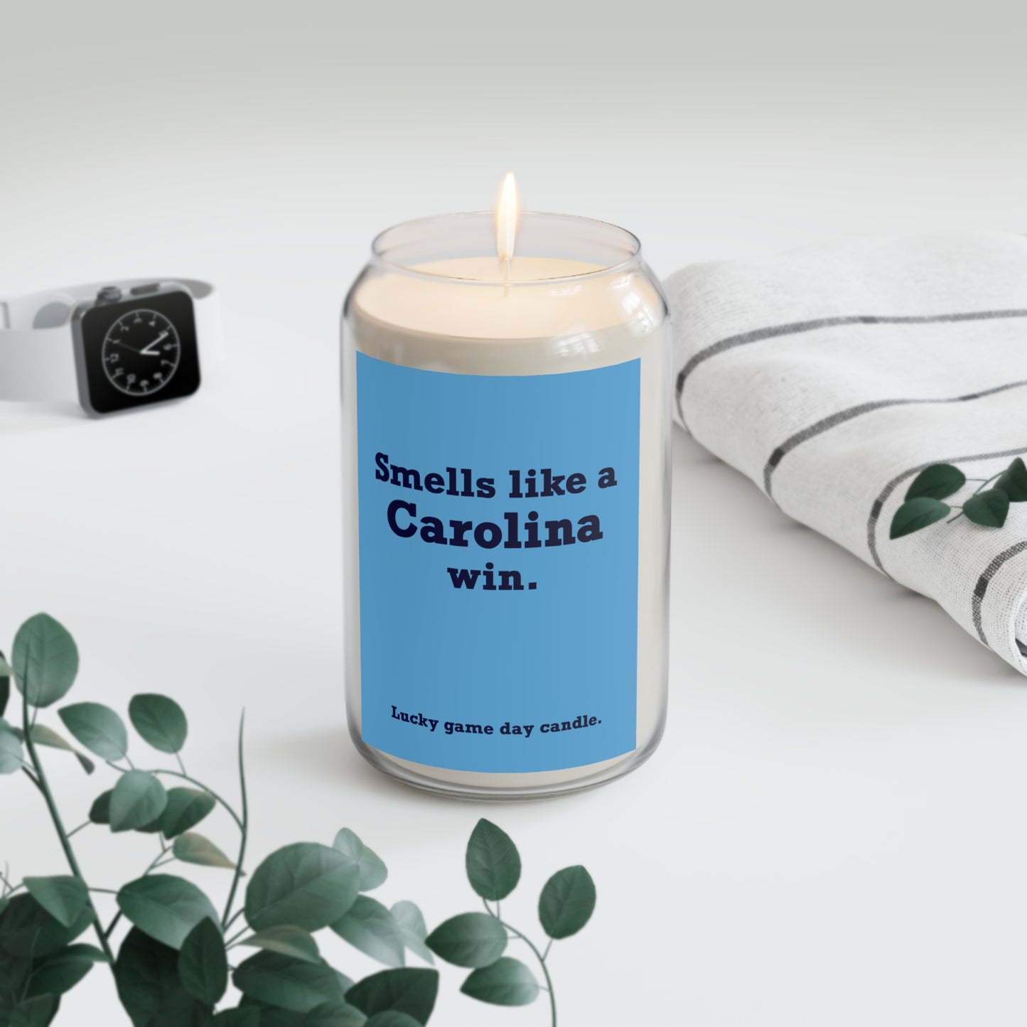 UNC - "Smells like a Carolina win" scented candle (13.75 oz)