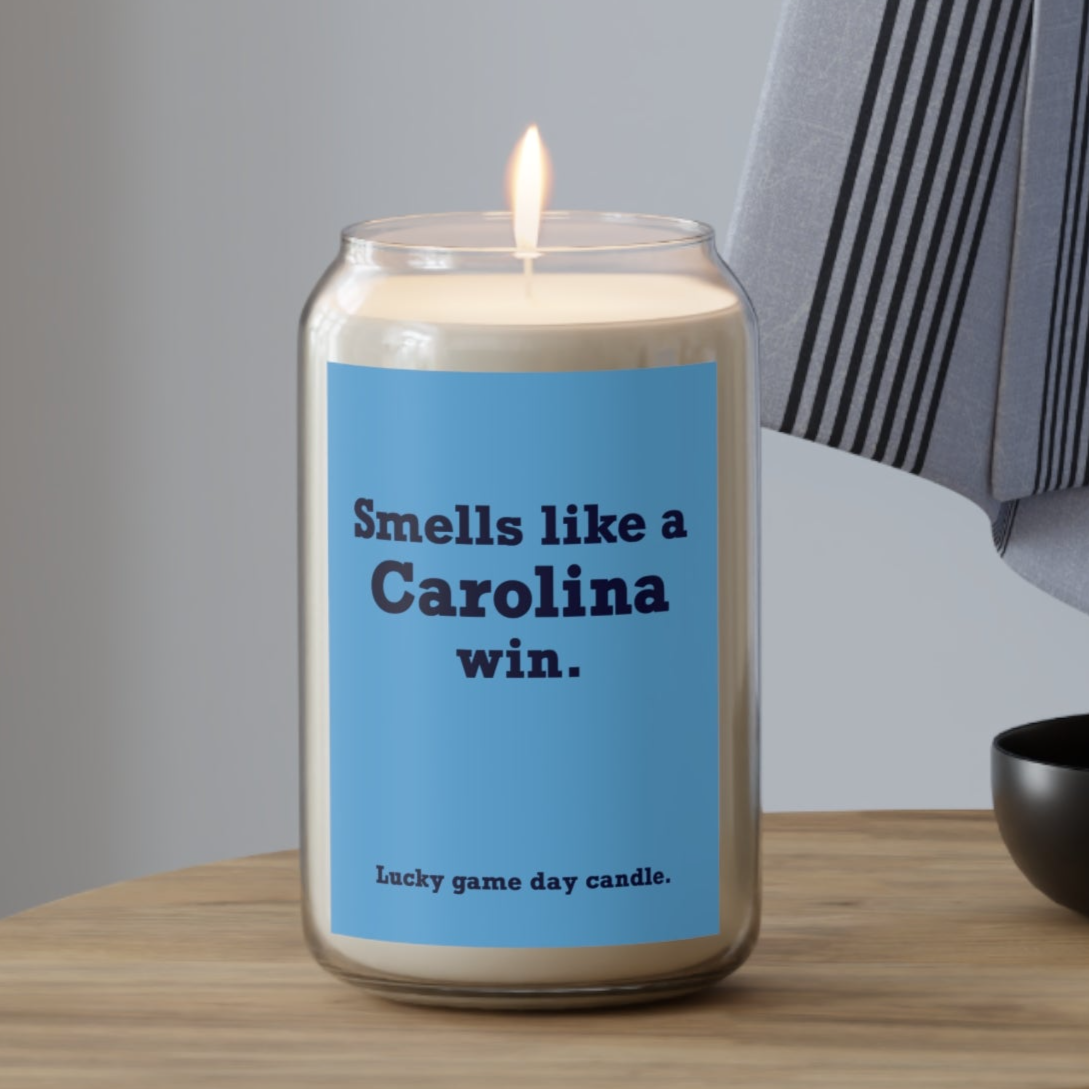 UNC - "Smells like a Carolina win" scented candle (13.75 oz)