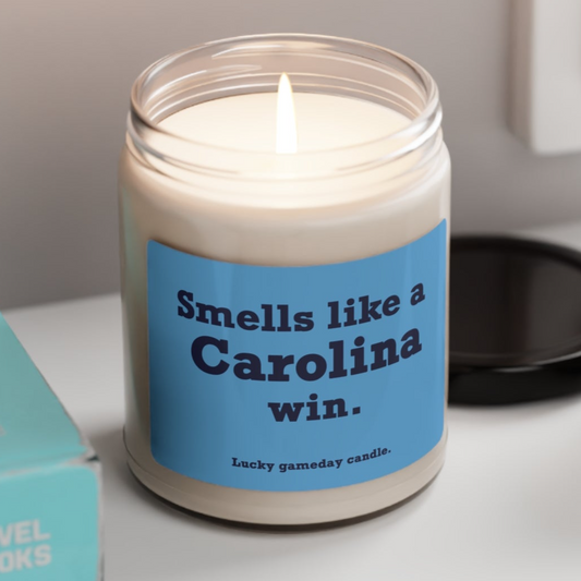 UNC - "Smells like a Carolina win" scented candle (9 oz)