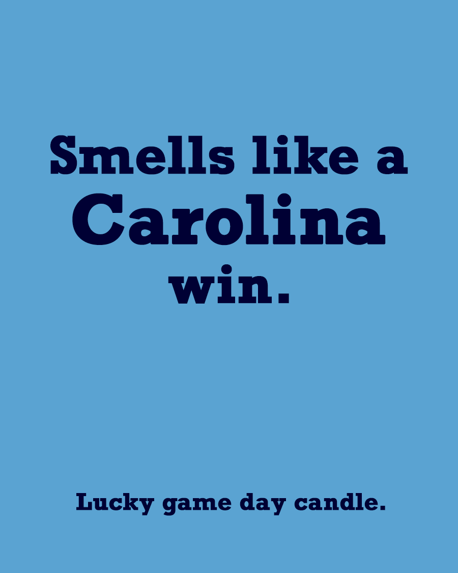 UNC - "Smells like a Carolina win" scented candle (13.75 oz)